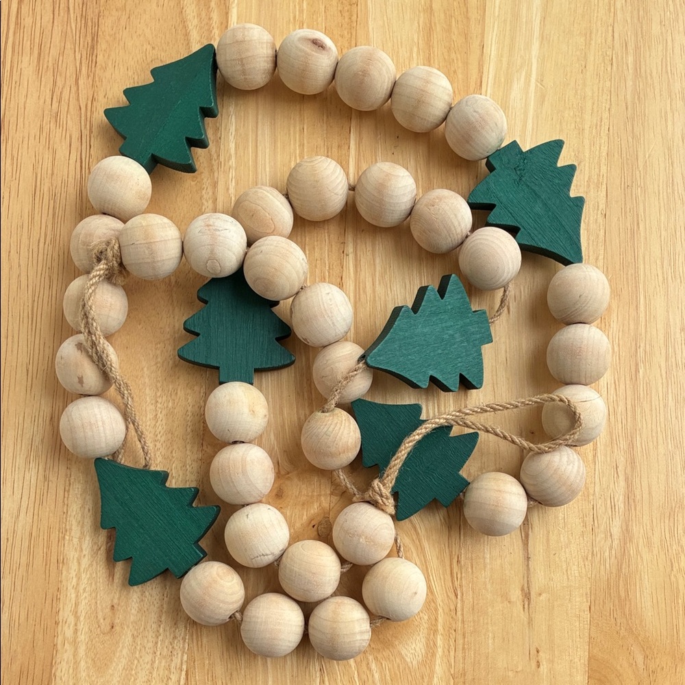 Wood Bead Garland with Green Tree Accents. About 73 inches. end to end